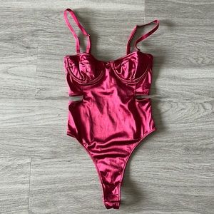 OUT FROM UNDER METALLIC BODYSUIT